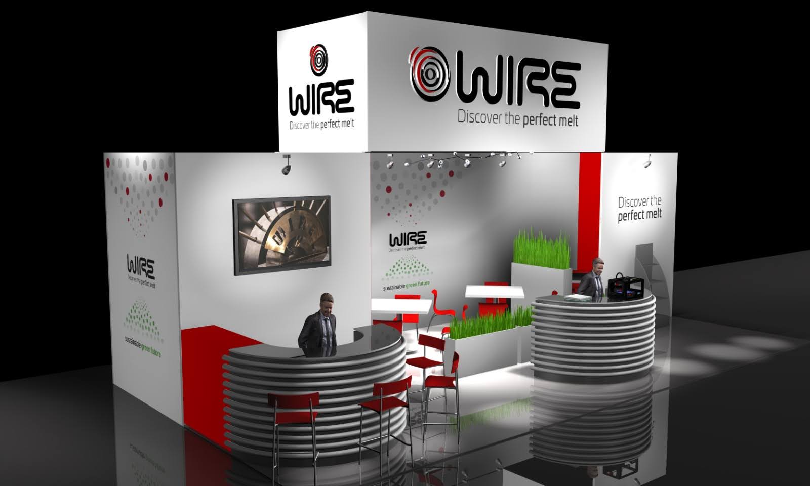3D izris sejemske stojnice WIRE z belo-rdečim dizajnom, ukrivljenima sprejemnima pultoma in visečim napisom znamke.
